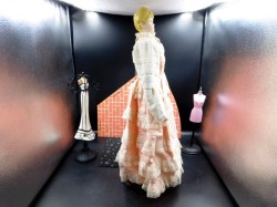 20 inch blonde porcelain pink doll side